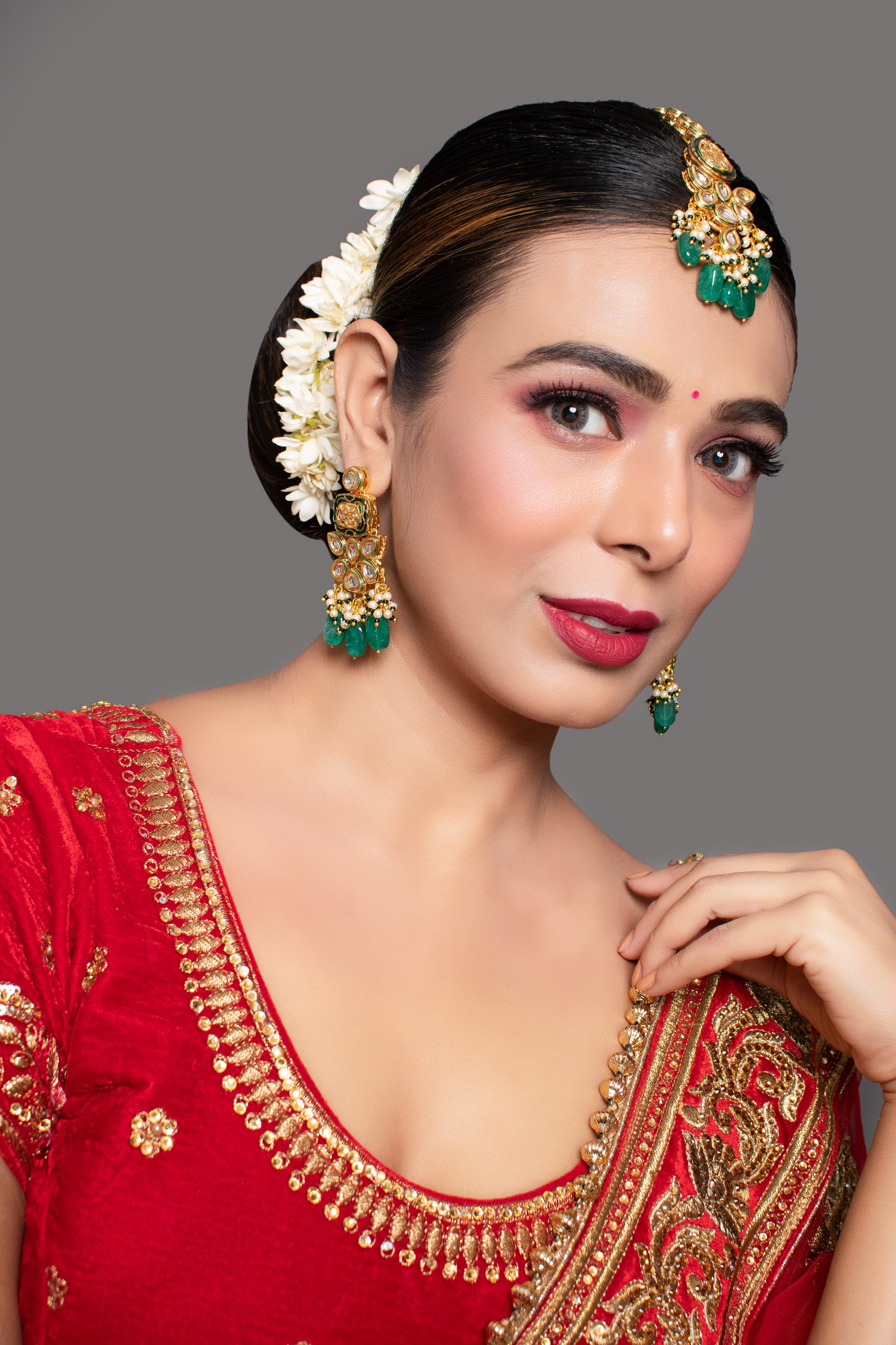 Radhika sarathkumar looks pretty in a red saree for a recent wedding! |  Fashionworldhub